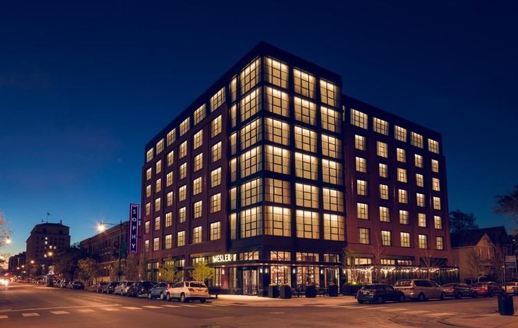 The hotel facade at night