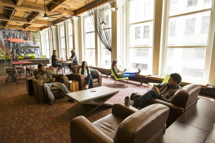 Several sofas in the common room