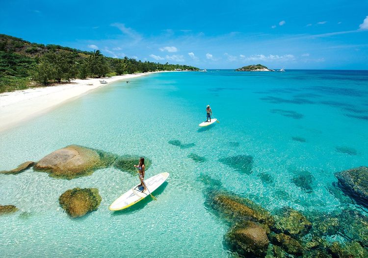 A Lizard Island, pratique du paddle, un dérivé du surf