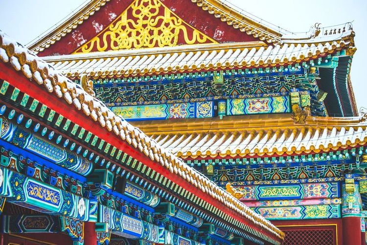 Les riches décorations colorées de la Cour de la Cité Interdite